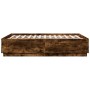 Bed frame with LED lights smoked oak wood 140x190 cm by , Beds and slatted bases - Ref: Foro24-3209643, Price: 165,36 €, Disc...