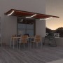 Toldo retráctil manual con luz LED naranja y marrón 600x350 cm de , Toldos - Ref: Foro24-3069245, Precio: 630,26 €, Descuento: %