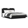 Estructura de cama con cabecero y luces LED negro 140x190 cm