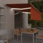 Manual retractable awning with blind and orange and brown LED 5x3m by vidaXL, Awnings - Ref: Foro24-3069345, Price: 459,17 €,...