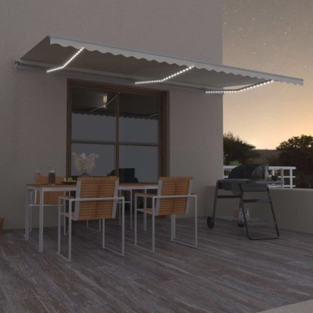 Manual retractable awning with cream LED light 600x300 cm by vidaXL, Awnings - Ref: Foro24-3068962, Price: 512,82 €, Discount: %