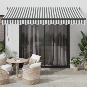 Retractable awning made of aluminum and anthracite fabric.