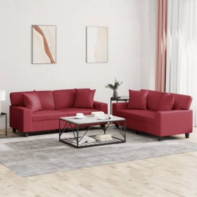 Zweiteiliges Sofaset mit roten Kunstlederkissen.