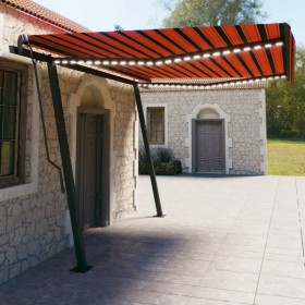 Manual retractable awning with orange and brown LED 4.5x3 m by vidaXL, Awnings - Ref: Foro24-3070165, Price: 580,81 €, Discou...